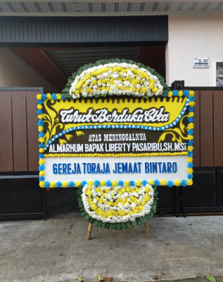 Papan Bunga Duka di Pancung Soal